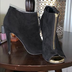 Black with gold zip up heeled booties